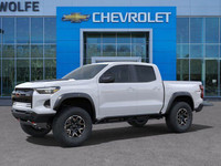 The 2025 Chevrolet Colorado ZR2, presented in Summit White with a Jet Black/Artemis interior, is eng... (image 4)