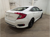 Experience the joy of driving the reliable and efficient Honda Civic Sedan LX Manual, boasting a sop... (image 6)