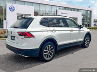 This Volkswagen Tiguan delivers a Intercooled Turbo Regular Unleaded I-4 2.0 L/121 engine powering t... (image 3)