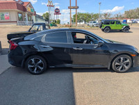 The 2016 Honda Civic Touring (VIN: 2HGFC1F9XGH111613) is a refined compact sedan that delivers a str... (image 7)