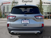This Ford Escape has a strong Intercooled Turbo Regular Unleaded I-3 1.5 L/91 engine powering this A... (image 4)