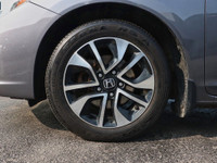 Experience the perfect blend of efficiency, comfort, and modern features with the 2015 Honda Civic E... (image 5)