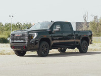 The 2025 GMC Sierra 3500 AT4 stands tall as a powerhouse of rugged sophistication, engineered to tak... (image 2)
