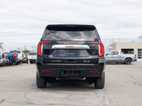 Spacious, capable, and ready for anything, the 2023 GMC Yukon XL SLE is a full-size SUV built to mov... (image 6)