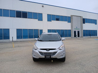 Drive with confidence in this 2011 Hyundai Tucson! With its spacious interior, smooth handling, and... (image 1)