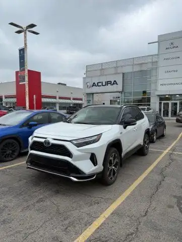 This Rav4 Prime comes equipped with a Power Sunroof, Sport Tuned Suspension, Wireless Apple CarPlay,...