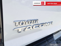 Check out this 2015 Toyota Tacoma 4WD Double Cab V6 Auto with 258,026 KMS, finished in a sleek White... (image 8)
