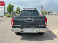 The 2019 Nissan Frontier SL offers a premium blend of rugged capability and refined comfort. Powered... (image 4)
