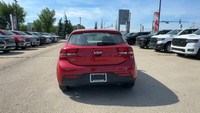 This Kia Rio is equipped with: Cloth, 6 Speakers, Cloth Seat Trim, Heated front seats, Radio: AM/FM/... (image 3)