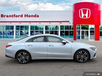 Experience the thrill of effortless performance and sophisticated style behind the wheel of this 202... (image 6)