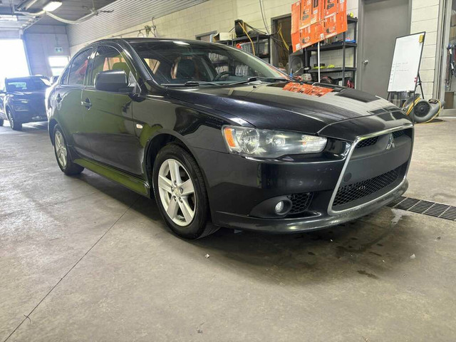 2014 Mitsubishi Lancer 4dr Sdn Man SE FWD in Cars & Trucks in Laval / North Shore - Image 3