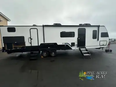 Heartland Corterra travel trailer 33.3BH highlights: Kitchen Island Two Sofas Spacious Full Bath Que...