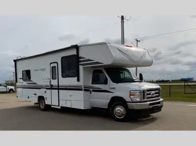 Coachmen Freelander Class C gas motorhome 27QB highlights: Rear Bedroom Bunk Over Cab 42in.in. x 71i...