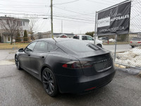This sleek 2018 Tesla Model S in black is a stylish and eco-friendly choice for your next ride. With... (image 1)