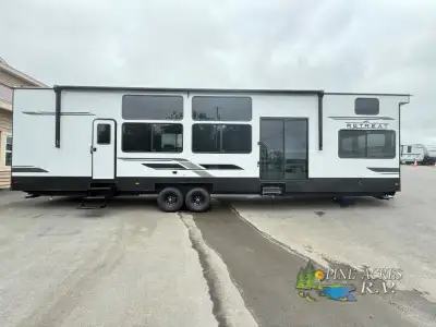Keystone Retreat destination trailer 391CLDL highlights: Double Loft Shower with a Seat Master Close...