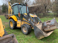 New Holland B95TC Loader Backhoe Package