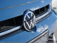 The 2025 Volkswagen Jetta Comfortline is a stunning blue sedan that offers a smooth driving experien... (image 8)