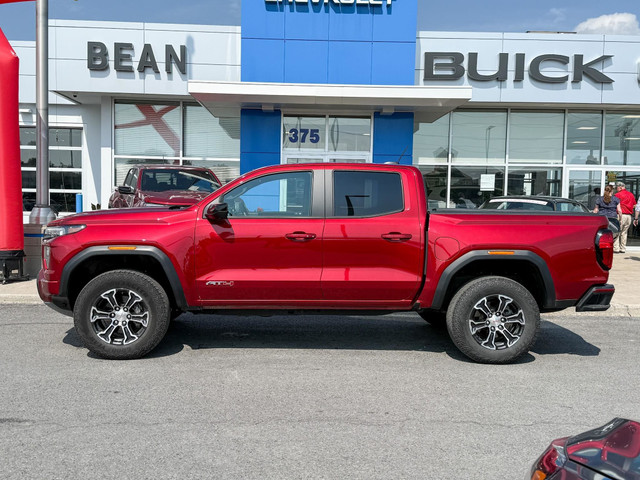 2024 GMC Canyon AT4 2.7L 4CYL AT4 4X4 WITH OEM 2" FACTORY LIF... in Cars & Trucks in Ottawa - Image 2
