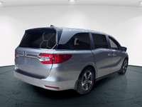 Meet the 2019 Honda Odyssey EX-L RES, a silver front-wheel-drive van that promises a smooth journey... (image 6)