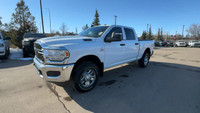 This 2024 RAM 2500 TRADESMAN CREW CAB 4X4 has the following options Cloth 40/20/40 Bench Seat, Uconn... (image 4)