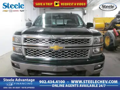 Mighty and Majestic, our 2015 Chevrolet Silverado 1500 LT Crew Cab 4X4 on display in Green works as...