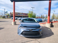 The 2021 Toyota Corolla LE is a compact sedan that offers a blend of efficiency, comfort, and advanc... (image 2)