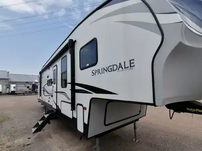 The whole gang will love camping in this Keystone Springdale fifth wheel! The rear private bunkhouse...