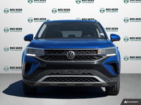 This 2022 Volkswagen Taos Comfortline is a practical and efficient compact SUV that offers smooth pe... (image 2)