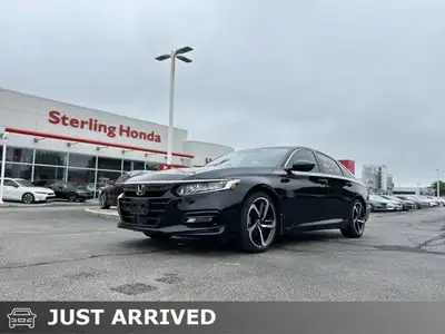 Experience the sleek lines and exhilarating performance of this 2020 Honda Accord Sport Sedan. With...