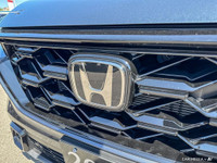 The 2025 Honda CR-V EX-L Hybrid blends fuel efficiency with premium comfort and advanced technology.... (image 7)
