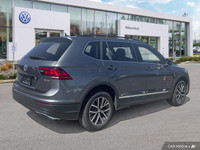 This Volkswagen Tiguan boasts a Intercooled Turbo Regular Unleaded I-4 2.0 L/121 engine powering thi... (image 4)
