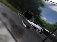 This 2021 Nissan Sentra SV is a stylish and reliable sedan with a sleek black exterior and a comfort... (image 9)