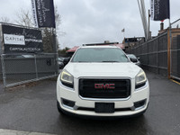 This 2014 GMC Acadia SLE-2 is a spacious and reliable SUV with a sleek white exterior and a comforta... (image 7)