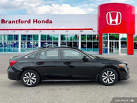 This 2022 Honda Civic Sedan LX boasts a sleek black exterior and a surprisingly spacious interior, p... (image 6)