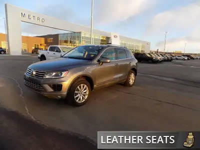 Leather Seats, Heated Seats, Rear View Camera, Bluetooth, Remote Keyless Entry! Metro Ford has reloc...