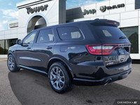 This Dodge Durango delivers a Intercooled Supercharger Premium Unleaded V-8 6.2 L/376 engine powerin... (image 4)