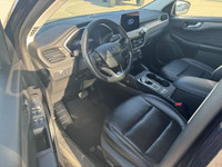 The 2021 Ford Escape Titanium AWD is a sleek and sporty compact SUV that balances style, comfort, an... (image 8)