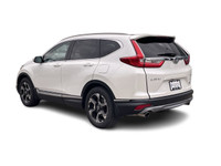 The 2018 Honda CR-V Touring trim represents the pinnacle of comfort, technology, and performance wit... (image 5)