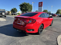 Turn heads in this vibrant Rallye Red 2020 Honda Civic Sedan Sport! This certified pre-owned beauty... (image 4)