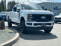 This 2023 Ford F-350 XLT has an Oxford White exterior and Medium Dark Interior with seating for 5. E... (image 9)