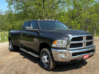Tough, reliable, and built to handle anything you throw its way — this 2017 Ram 3500 SLT Dually with... (image 7)