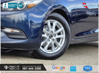 Just Arrived 2018 Mazda MAZDA3 i Touring AT 5-Door Blue has 102,283 KM on it. 2L 4 Cylinder Engine e... (image 8)