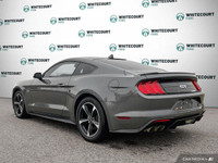 This Carbonized Grey Metallic 2022 Ford Mustang GT is an iconic sports car that delivers exhilaratin... (image 3)