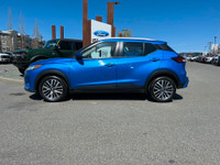 This 2023 Nissan Kicks has a Blue Exterior and Grey Interior with seating for 5. Equipped with a 1.6... (image 1)