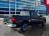 This Ram 1500 has a trusty Twin Turbo Regular Unleaded I-6 3.0 L/183 engine powering this Automatic... (image 6)