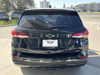 The 2022 Chevrolet Equinox RS brings a bold and athletic look with its Mosaic Black Metallic paint,... (image 6)