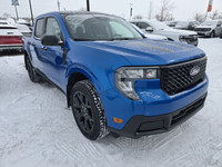 This brand new VELOCITY BLUE METALLIC 2025 FORD MAVERICK XLT is powered by a 2.0L ECOBOOST ENGINE TH... (image 8)