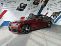 2022 BMW 750i xDrive AWD 8-Speed Automatic V8 EXTERIOR - AVENTURINE RED III METALLIC INTERIOR - COGN... (image 4)