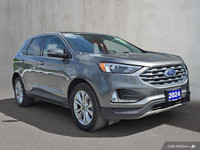 This 2024 Ford Edge Titanium AWD, presented in a sophisticated *Gray* finish, offers a compelling bl... (image 8)