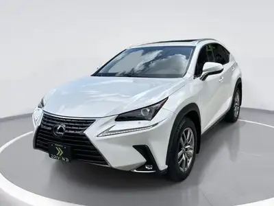 Experience the elegance and dynamic driving experience offered by the stunning White Lexus NX 300 AW...
